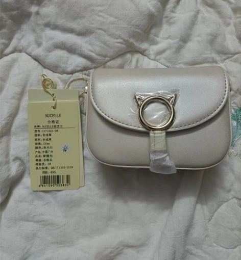 纽芝兰珠光白小斜挎包 纽芝兰品牌，全新有吊...