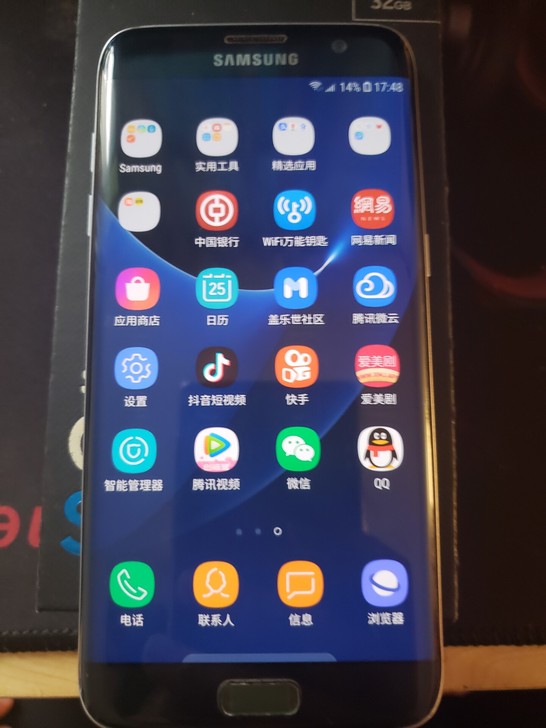 以前用的闲置手机三星s7e 换过后盖玻璃 ...
