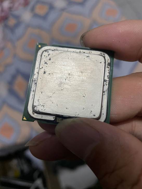 上学时候的电脑拆机cpu，核心年代的核心产...