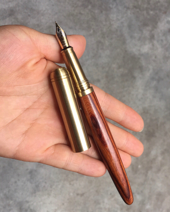 出钢笔,黄铜木钢笔,自用,正常可用。实木+...