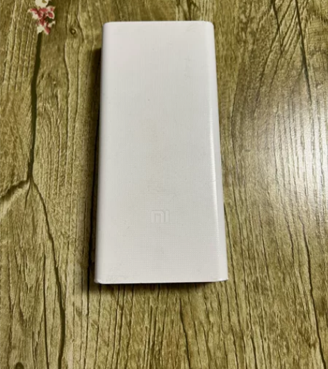 全新的小米移动电源快充版1000毫安,双输...