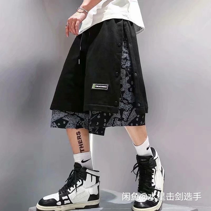 夏季侧边排扣拼接腰果花休闲短裤男潮流假两件...