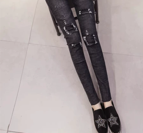 新款时尚百搭破洞女士牛仔裤高腰显瘦女九分小...