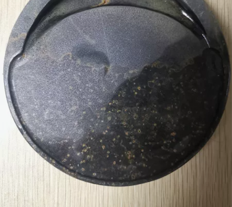 歙砚老坑金星圆形砚,直径11.5cm,厚1...