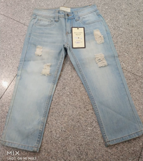 女士全新中低腰无弹浅蓝破洞七分水洗牛仔裤2...