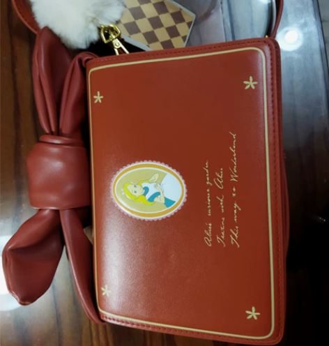 不莱玫红色蝴蝶结公主包包皮方包女包儿童包马...