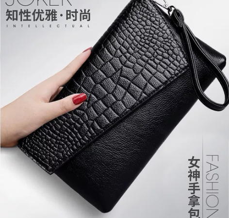 真皮手拿包女2022新款大容量手抓包斜挎包...